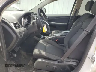 2017 Dodge Journey SXT with VIN 3C4PDDBG0HT542623, listed as a Copart auction lot 61628385 with 130,285 mi miles and Salvage title. Bid and sale history available at DreamBid. Image 7.