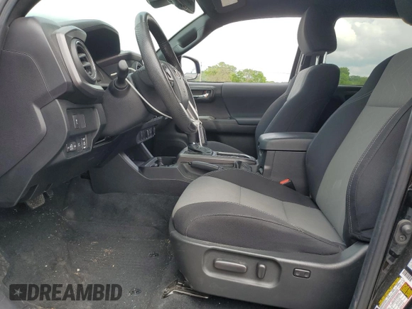 2023 Toyota Tacoma SR with VIN 3TMCZ5AN2PM577873, listed as a Copart auction lot 57361315 with 50,110 mi miles and Salvage title. Bid and sale history available at DreamBid. Image 7.