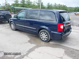 2013 Chrysler Town & Country Touring z VIN 2C4RC1BG4DR775847, wystawiony jako IAAI lot #42312814 z przebiegiem 119 815 mil mil oraz . Historia ofert i sprzedaży dostępna na DreamBid. Obrazek 3.