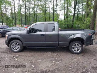 2018 Ford F-150 XL z VIN 1FTEX1EPXJFA67913, wystawiony jako IAAI lot #42264824 z przebiegiem 60 058 mil mil oraz . Historia ofert i sprzedaży dostępna na DreamBid. Obrazek 14.