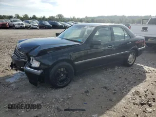 1999 Mercedes-Benz C 230/260/280/320 with VIN WDBHA29G0XA724818, listed as a Copart auction lot 71455614 with 182,525 mi miles and Salvage Title. Bid and sale history available at carsss.com. Image 1.