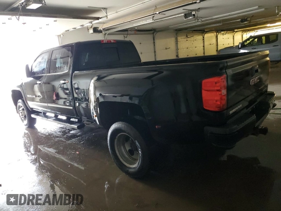 2015 GMC Sierra 3500HD Denali z VIN 1GT424E85FF130203, wystawiony jako Copart lot #84489854 z przebiegiem 211 289 mil mil oraz Szkoda całkowita • Salvage title. Historia ofert i sprzedaży dostępna na DreamBid. Obrazek 2.