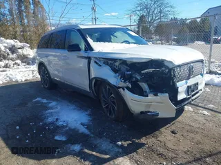 2021 Lincoln Aviator Reserve z VIN 5LM5J7XC3MGL08085, wystawiony jako IAAI lot #41482512 z przebiegiem 61 248 mil mil oraz . Historia ofert i sprzedaży dostępna na DreamBid. Obrazek 1.