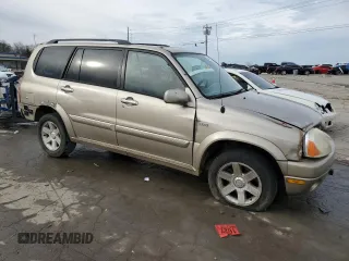 2002 Suzuki XL7 Standard z VIN JS3TX92V424130897, wystawiony jako Copart lot #84635434 z przebiegiem 208 447 mil mil oraz Szkoda całkowita • Salvage title. Historia ofert i sprzedaży dostępna na DreamBid. Obrazek 4.