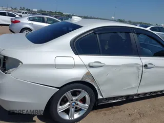 2012 BMW 3 Series 328i with VIN WBA3A5C51CF349987, listed as a IAAI auction lot 42013599 with 256,461 mi miles. Bid and sale history available at carsss.com. Image 6.