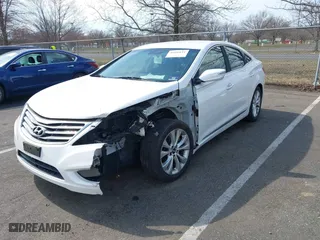 2013 Hyundai Azera with VIN KMHFG4JG7DA247682, listed as a IAAI auction lot 41843611 with 63,009 mi miles. Bid and sale history available at carsss.com. Image 2.