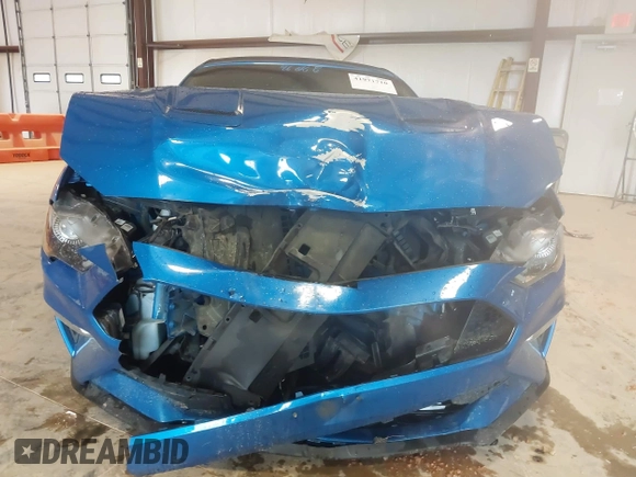 2020 Ford Mustang GT Premium z VIN 1FATP8FF4L5113062, wystawiony jako IAAI lot #41971710 z przebiegiem 111 864 mil mil oraz . Historia ofert i sprzedaży dostępna na DreamBid. Obrazek 12.