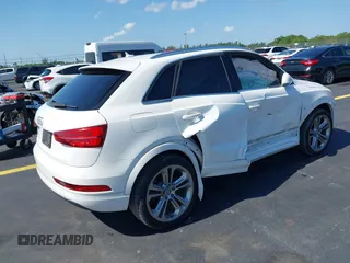 2016 Audi Q3 Premium Plus z VIN WA1BFCFS0GR014028, wystawiony jako IAAI lot #42274987 z przebiegiem 64 667 mil mil oraz . Historia ofert i sprzedaży dostępna na DreamBid. Obrazek 4.
