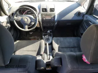 2012 Suzuki SX4 LE with VIN JS2YC5A3XC6301561, listed as a Copart auction lot 44514305 with 247,718 mi miles and Salvage Title. Bid and sale history available at DreamBid. Image 8.
