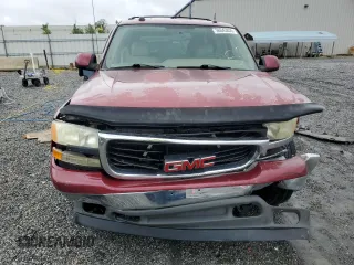 2005 GMC Yukon SLT z VIN 1GKEK13T65J115199, wystawiony jako Copart lot #56043835 z przebiegiem 245 988 mil mil oraz Szkoda całkowita • Salvage title. Historia ofert i sprzedaży dostępna na DreamBid. Obrazek 5.
