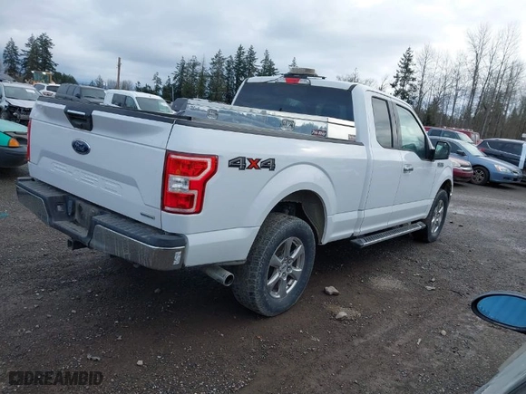 2018 Ford F-150 XL with VIN 1FTFX1EG9JKC44950, listed as a IAAI auction lot 41320276 with 67,496 mi miles. Bid and sale history available at carsss.com. Image 4.