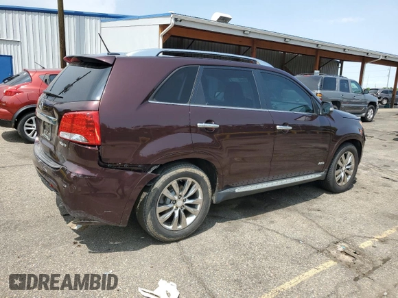 2013 Kia Sorento SX with VIN 5XYKWDA2XDG363999, listed as a Copart auction lot 58200985 with 69,056 mi miles and Salvage title. Bid and sale history available at DreamBid. Image 3.