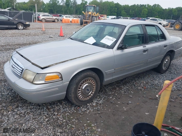 2000 Ford Crown Victoria with VIN 2FAFP73W6YX194471, listed as a IAAI auction lot 42102220 with 131,855 mi miles. Bid and sale history available at carsss.com. Image 2.