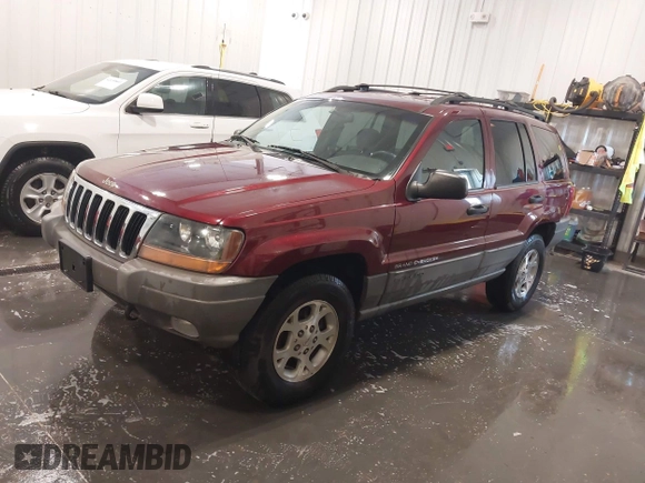 2000 Jeep Grand Cherokee Laredo z VIN 1J4GW48N8YC151600, wystawiony jako IAAI lot #42178535 z przebiegiem 71 207 mil mil oraz . Historia ofert i sprzedaży dostępna na DreamBid. Obrazek 2.