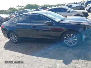 2020 Acura TLX w/Technology Pkg with VIN 19UUB1F57LA016345, listed as a IAAI auction lot 41661004 with 66,501 mi miles. Bid and sale history available at carsss.com. Image 14.