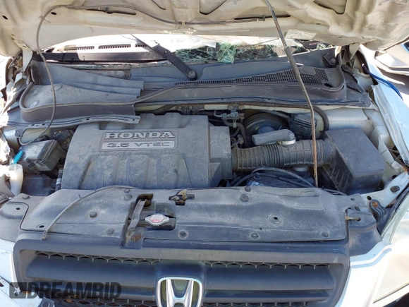 2005 Honda Pilot EX with VIN 5FNYF18405B063686, listed as a IAAI auction lot 39906381 with 241,904 mi miles. Bid and sale history available at carsss.com. Image 10.