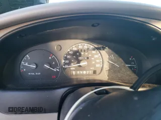 1999 Ford Ranger XLT with VIN 1FTYR10X8XUB20062, listed as a Copart auction lot 85779884 with 104,741 mi miles and Salvage title. Bid and sale history available at DreamBid. Image 9.