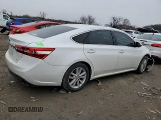 2013 Toyota Avalon XLE with VIN 4T1BK1EB3DU024158, listed as a Copart auction lot 44615475 with 212,781 mi miles and Salvage Title. Bid and sale history available at DreamBid. Image 3.