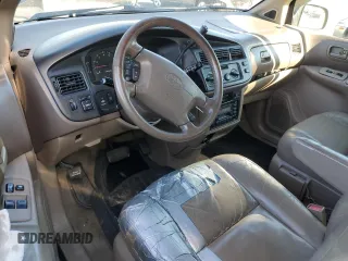 1999 Toyota Sienna LE with VIN 4T3ZF13C5XU144781, listed as a Copart auction lot 48932535 with 216,436 mi miles and Salvage Title. Bid and sale history available at carsss.com. Image 8.