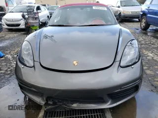 2018 Porsche 718 Boxster z VIN WP0CA2A86JS210697, wystawiony jako Copart lot #42892433 z przebiegiem 31 879 mil mil oraz . Historia ofert i sprzedaży dostępna na DreamBid. Obrazek 5.