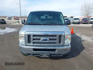 2010 Ford Econoline Passenger XL z VIN 1FBNE3BL8ADA65211, wystawiony jako IAAI lot #41659231 z przebiegiem 173 471 mil mil oraz . Historia ofert i sprzedaży dostępna na DreamBid. Obrazek 12.