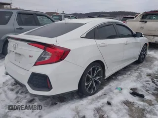 2018 Honda Civic Si with VIN 2HGFC1E50JH706377, listed as a IAAI auction lot 41384413 with 76,115 mi miles and . Bid and sale history available at DreamBid. Image 4.