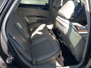 2017 Ford Fusion Energi Titanium with VIN 3FA6P0SU5HR105477, listed as a IAAI auction lot 41072696 with 92,926 mi miles. Bid and sale history available at carsss.com. Image 8.