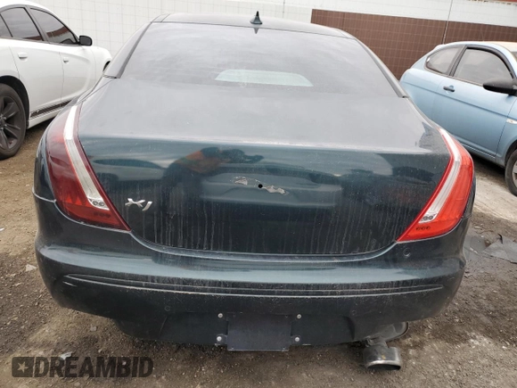 2015 Jaguar XJ with VIN SAJWA2GZ0F8V86007, listed as a Copart auction lot 82233514 with Not Provided miles and Clean Title. Bid and sale history available at carsss.com. Image 6.