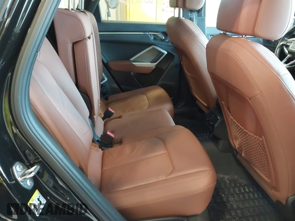 2021 Audi Q3 S line Premium Plus with VIN WA1EECF32M1054629, listed as a IAAI auction lot 41588322 with 33,385 mi miles and . Bid and sale history available at DreamBid. Image 8.