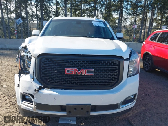 2019 GMC Yukon XL SLE z VIN 1GKS2FKC9KR147823, wystawiony jako IAAI lot #41571738 z przebiegiem 95 764 mil mil oraz . Historia ofert i sprzedaży dostępna na DreamBid. Obrazek 12.