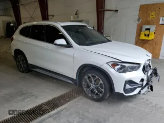 2020 BMW X1 xDrive28i z VIN WBXJG9C00L5P42487, wystawiony jako Copart lot #59669325 z przebiegiem 88 402 mil mil oraz Szkoda całkowita • Salvage title. Historia ofert i sprzedaży dostępna na DreamBid. Obrazek 4.