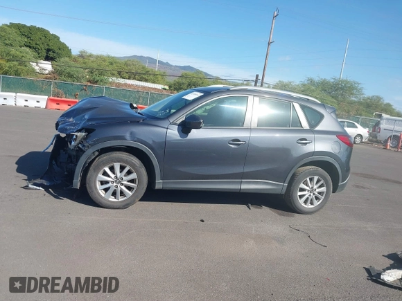 2014 Mazda CX-5 Sport with VIN JM3KE2BE4E0414721, listed as a IAAI auction lot 41408914 with Not Provided miles and . Bid and sale history available at carsss.com. Image 14.