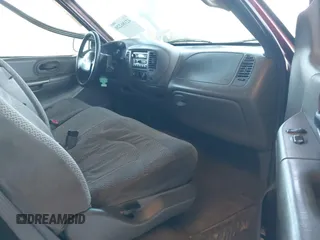 1999 Ford F-150 z VIN 1FTZX1721XNA79241, wystawiony jako IAAI lot #42186220 z przebiegiem Nie podano mil oraz . Historia ofert i sprzedaży dostępna na DreamBid. Obrazek 5.