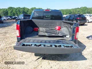 2019 Ram 1500 Big Horn z VIN 1C6RRFFG0KN909003, wystawiony jako IAAI lot #39513660 z przebiegiem 84 291 mil mil oraz . Historia ofert i sprzedaży dostępna na DreamBid. Obrazek 17.