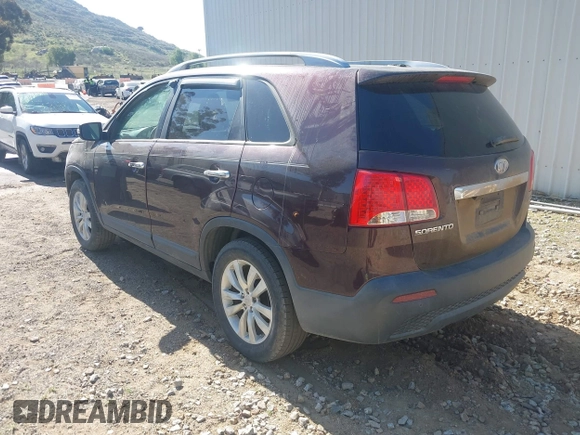 2011 Kia Sorento EX with VIN 5XYKU4A20BG001554, listed as a IAAI auction lot 41954009 with 119,323 mi miles. Bid and sale history available at carsss.com. Image 3.