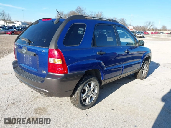 2005 Kia Sportage LX with VIN KNDJF723157097517, listed as a IAAI auction lot 41485759 with 207,294 mi miles and . Bid and sale history available at carsss.com. Image 4.