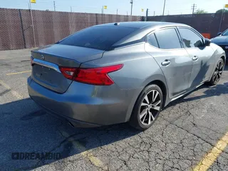 2018 Nissan Maxima SL with VIN 1N4AA6AP1JC400557, listed as a IAAI auction lot 42094626 with 96,764 mi miles and . Bid and sale history available at DreamBid. Image 4.