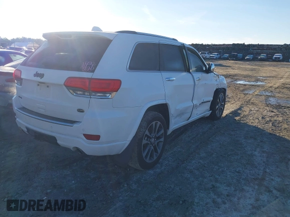 2017 Jeep Grand Cherokee Overland with VIN 1C4RJFCG8HC641729, listed as a IAAI auction lot 41233125 with 116,874 mi miles. Bid and sale history available at carsss.com. Image 4.