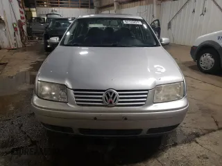 1999 Volkswagen Jetta z VIN 3VWSC29M4XM116002, wystawiony jako Copart lot #82159824 z przebiegiem 145 008 mil mil oraz Czysty tytuł • Clean title. Historia ofert i sprzedaży dostępna na DreamBid. Obrazek 5.