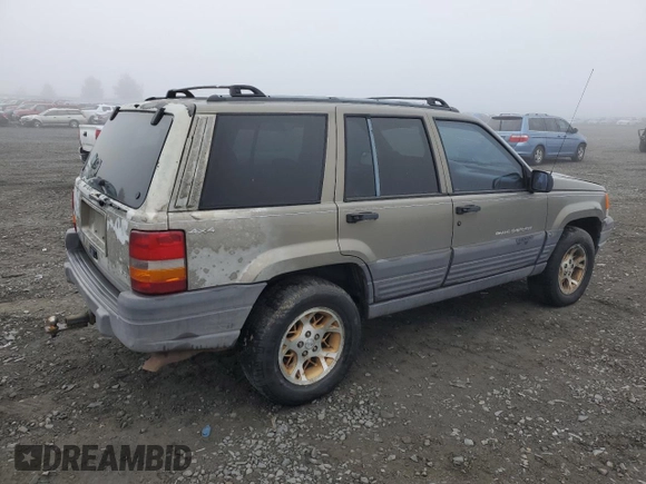 1997 Jeep Grand Cherokee Laredo with VIN 1J4GZ58Y5VC637350, listed as a Copart auction lot 77405444 with 182,482 mi miles and Clean Title. Bid and sale history available at carsss.com. Image 3.