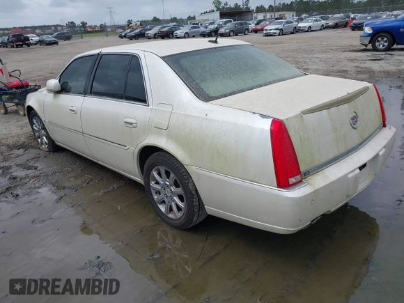 2008 Cadillac DTS 1SD z VIN 1G6KD57Y28U112764, wystawiony jako IAAI lot #41953240 z przebiegiem Nie podano mil oraz . Historia ofert i sprzedaży dostępna na DreamBid. Obrazek 3.