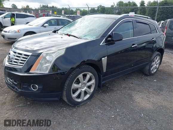 2015 Cadillac SRX Performance Collection with VIN 3GYFNFE35FS591343, listed as a IAAI auction lot 42644949 with 118,718 mi miles and . Bid and sale history available at DreamBid. Image 2.