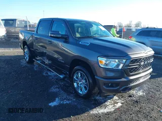 2023 Ram 1500 Big Horn z VIN 1C6RRFFG2PN599704, wystawiony jako IAAI lot #41807359 z przebiegiem 77 003 mil mil oraz . Historia ofert i sprzedaży dostępna na DreamBid. Obrazek 1.