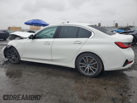 2021 BMW 3 Series 330i with VIN 3MW5R1J0XM8B48990, listed as a Copart auction lot 49277185 with 69,776 mi miles and Salvage Title. Bid and sale history available at carsss.com. Image 2.