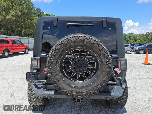 2013 Jeep Wrangler Unlimited Sport z VIN 1C4BJWDG3DL658674, wystawiony jako Copart lot #54851685 z przebiegiem 113 852 mil mil oraz Czysty tytuł • Clean title. Historia ofert i sprzedaży dostępna na DreamBid. Obrazek 6.