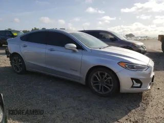 2019 Ford Fusion Titanium z VIN 3FA6P0RU5KR217242, wystawiony jako Copart lot #51985955 z przebiegiem 95 220 mil mil oraz Szkoda całkowita • Salvage title. Historia ofert i sprzedaży dostępna na DreamBid. Obrazek 4.
