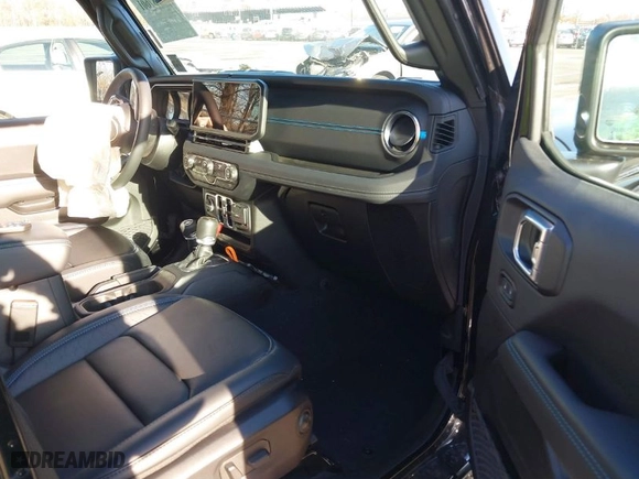 2024 Jeep Wrangler 4xe High Altitude with VIN 1C4RJXU66RW163211, listed as a IAAI auction lot 40887601 with 5,782 mi miles. Bid and sale history available at carsss.com. Image 5.