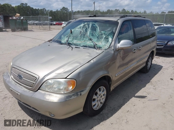 2005 Kia Sedona LX with VIN KNDUP131756627998, listed as a IAAI auction lot 42058213 with 152,433 mi miles. Bid and sale history available at carsss.com. Image 2.