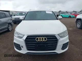 2016 Audi Q3 Premium Plus with VIN WA1BFCFS0GR009654, listed as a IAAI auction lot 42141372 with 138,992 mi miles. Bid and sale history available at carsss.com. Image 12.