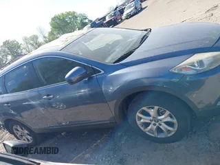 2014 Mazda CX-9 Touring with VIN JM3TB2CV4E0430932, listed as a IAAI auction lot 41992552 with 133,989 mi miles and . Bid and sale history available at carsss.com. Image 13.